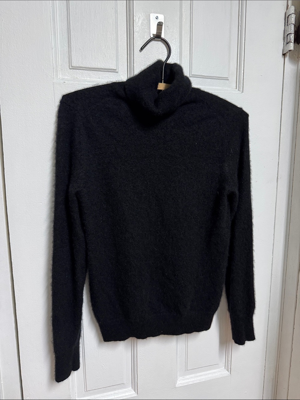 Uniqlo Turtleneck Knit Sweater I would consider this a little shrunken to be xs